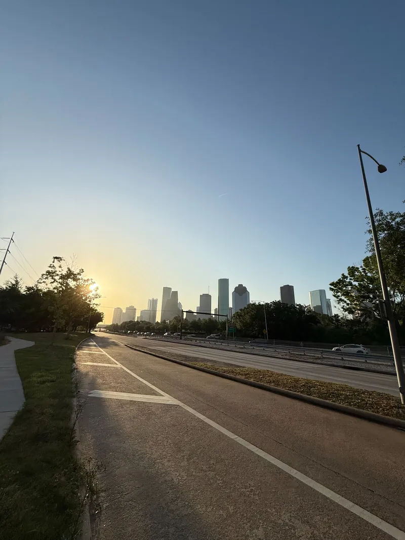 Downtown Houston skyline at golden hour from Memorial Drive